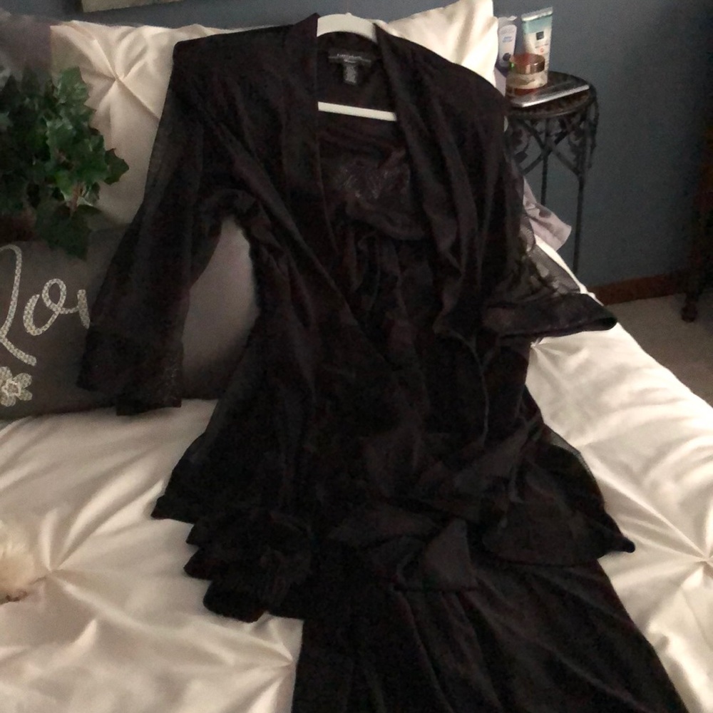 Three piece dressy pants suit.